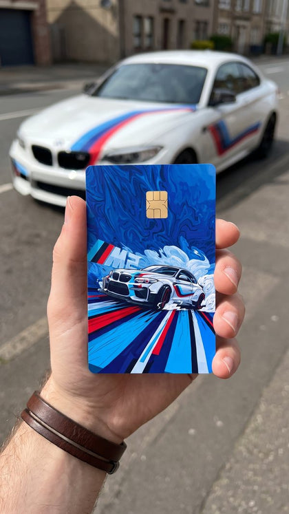 A personalized car card sticker held up, race car